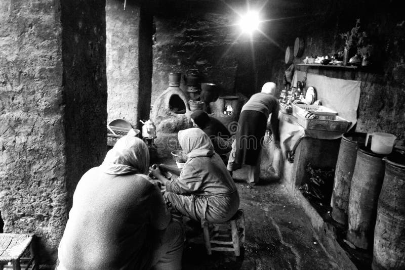 Atlas women working on their kitchen