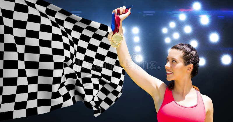 Atleta que sostiene las medallas contra bandera a cuadros en estadio imagen de archivo Atleta que sostiene las medallas contra bandera a cuadros en estadio imagen de archivo