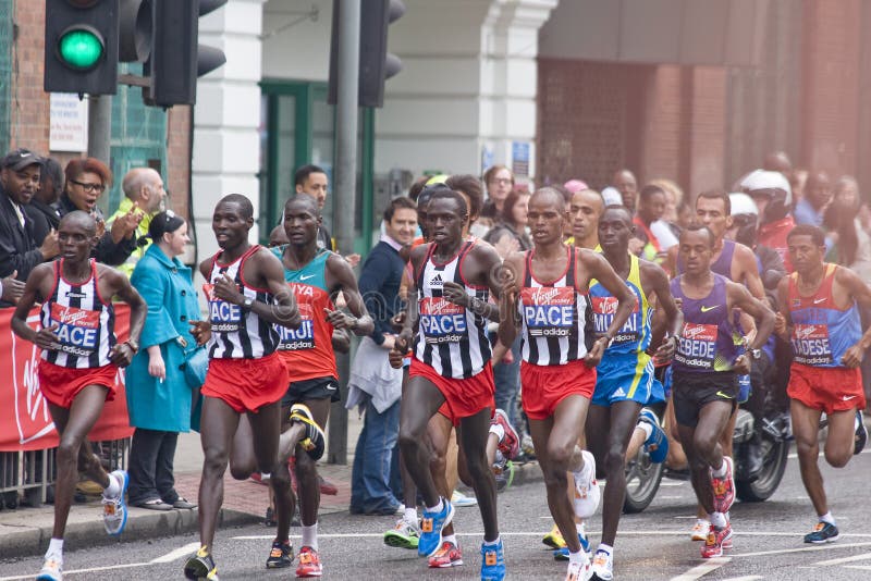 Elite men athletes at London Virgin marathon 2010, about 8 miles in to the race, the winner - Kebede Tsegaye-third on a right. Elite men athletes at London Virgin marathon 2010, about 8 miles in to the race, the winner - Kebede Tsegaye-third on a right