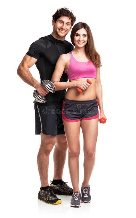 Atletisch paar - man en vrouw met domoren op het wit stock fotografie Atletisch paar - man en vrouw met domoren op het wit stock fotografie