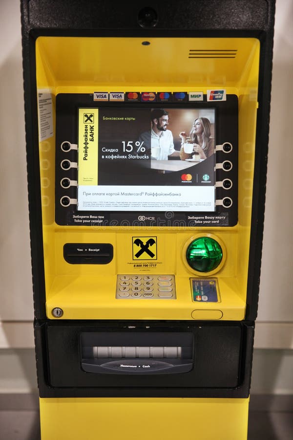 ATM of `Raiffeisen Bank` to conduct banking operations. Moscow.