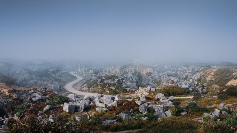 Atmospheric view overlooking a deserted Tout Quarry sculpture park and nature reserve