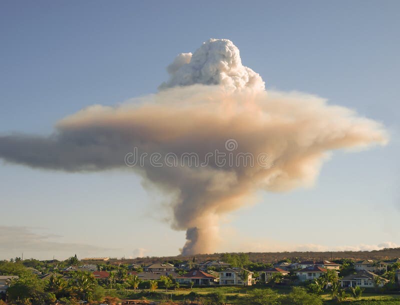 Mushroom cloud of smoke above burning sugar cane fields in Maui. Mushroom cloud of smoke above burning sugar cane fields in Maui