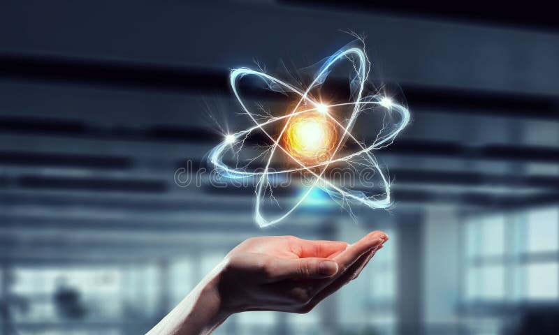 Atomsymbolen gömma i handflatan in Blandat massmedia Blandat massmedia arkivfoto Atomsymbolen gömma i handflatan in Blandat massmedia Blandat massmedia arkivfoto