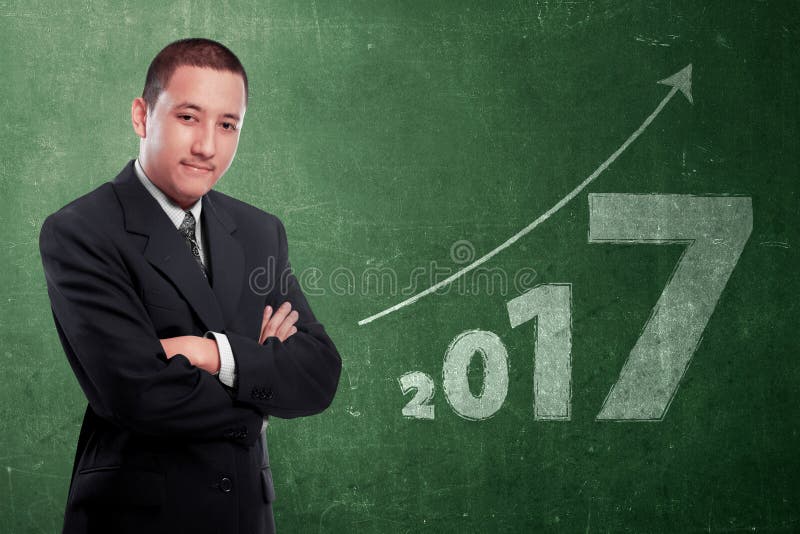 Atrakcyjny azjatykci biznesmen z liczbą 2017 obrazy stock Atrakcyjny azjatykci biznesmen z liczbą 2017 obrazy stock