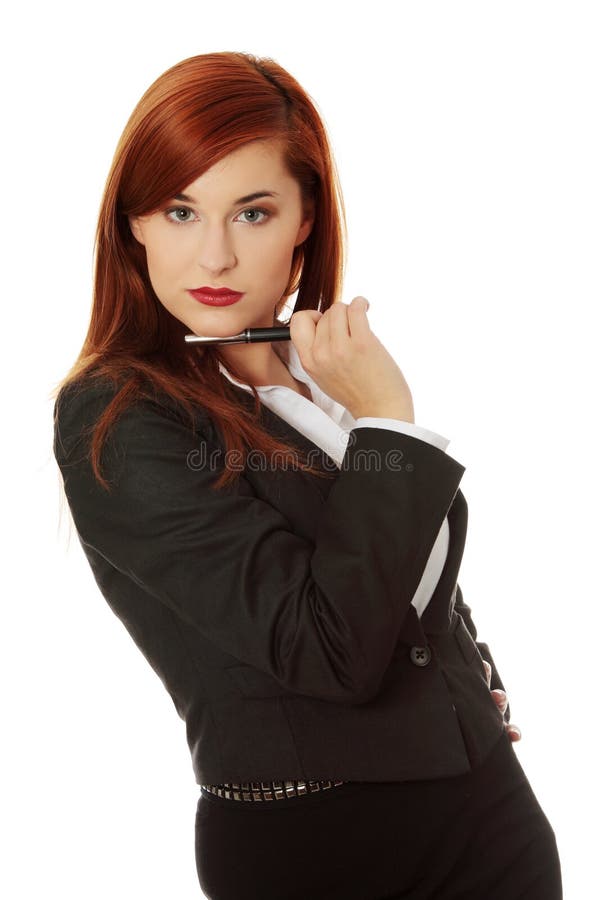 Attractive businesswoman with a pen. Attractive businesswoman with a pen