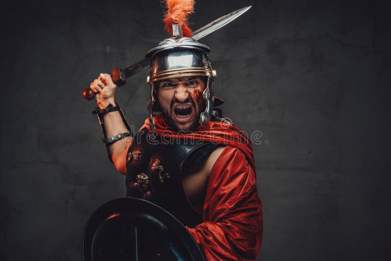 Attacking roman soldier screaming with sword and shield