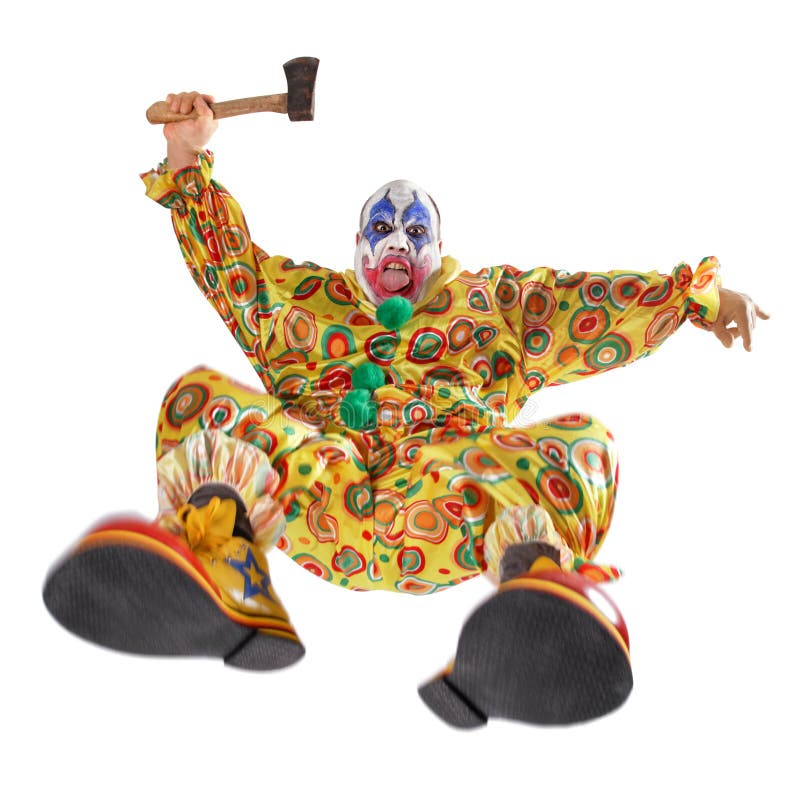 A nasty evil clown, angry, jumping, and about to hack you to bits. Motion blur on the knees and shoes. A nasty evil clown, angry, jumping, and about to hack you to bits. Motion blur on the knees and shoes.