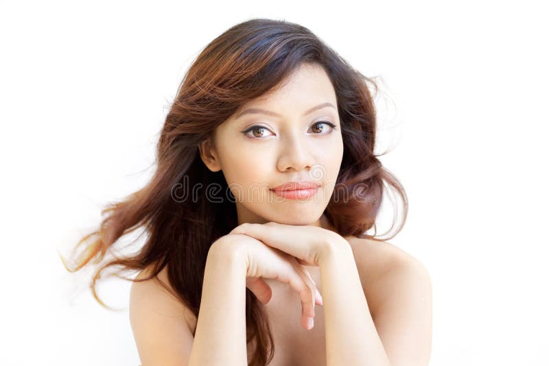 Attentive Asian Beauty waiting with chin on hands stock photos