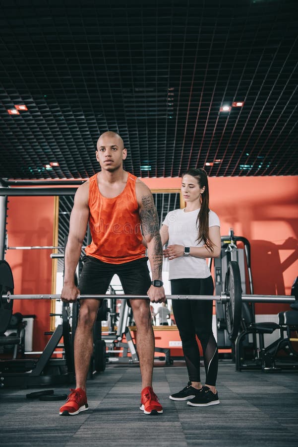 Attentive Trainer Standing Near African American Stock Image Image Of