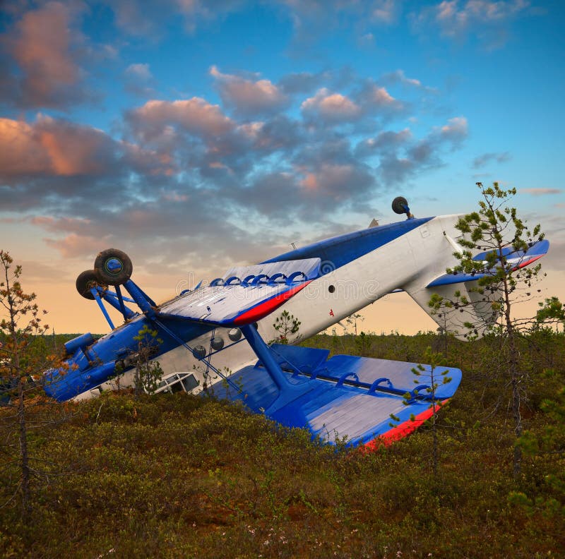 Biplane had crashed in marsh due to engine failure. Plane had rotation after emergency landing on the marsh. It lay up landing gear. Biplane had crashed in marsh due to engine failure. Plane had rotation after emergency landing on the marsh. It lay up landing gear.