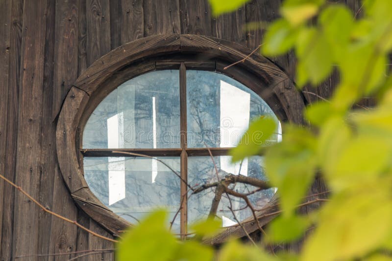 Attic window in abandoned house