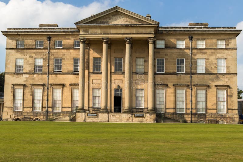 Facade of Attingham Hall, an 18th century country house stately home owned by the National Trust. Atcham, Shrewsbury, Shropshire, England, UK. Facade of Attingham Hall, an 18th century country house stately home owned by the National Trust. Atcham, Shrewsbury, Shropshire, England, UK.