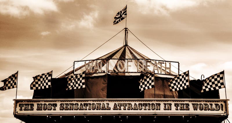 A great picture taken at the Cowpie country fair of a wall of death motorcycle fair ground attraction - May 2015. A great picture taken at the Cowpie country fair of a wall of death motorcycle fair ground attraction - May 2015