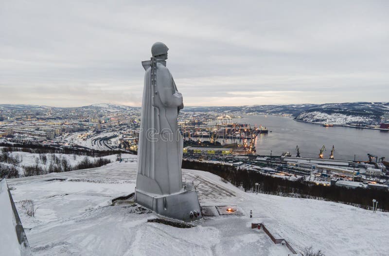 Attractions of the town. View of Monument to the Defenders of the Arctic the main symbol of the town on short winter day. top view