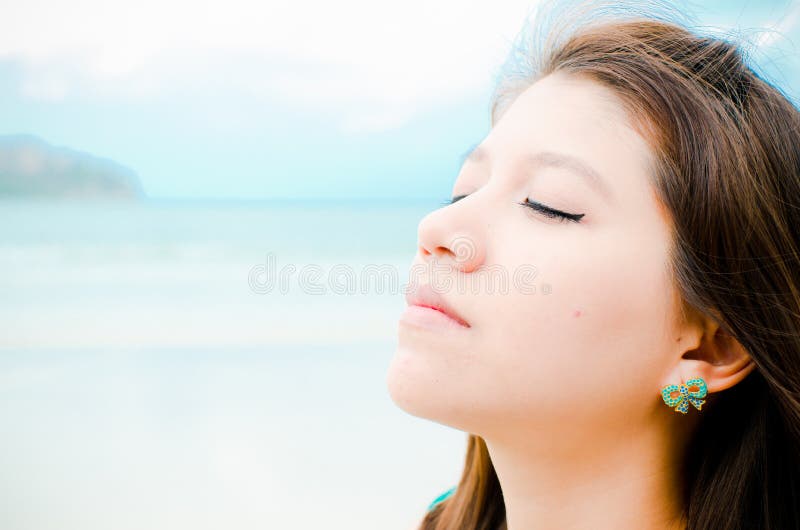 Attractive Asian woman enjoy on the beach