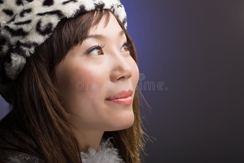 Attractive asian woman looking up royalty free stock photography
