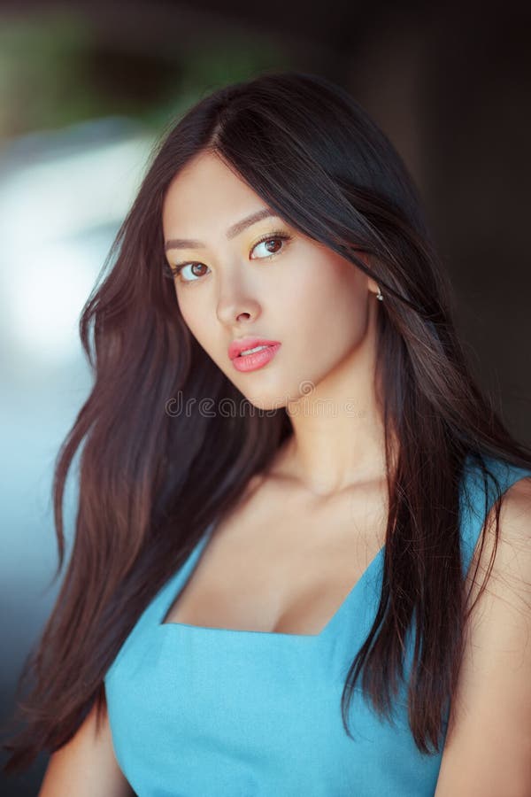 https://thumbs.dreamstime.com/b/attractive-asian-woman-portrait-sensual-lovely-beautiful-mixed-race-caucasian-young-girl-looking-camera-outdoor-against-104456476.jpg