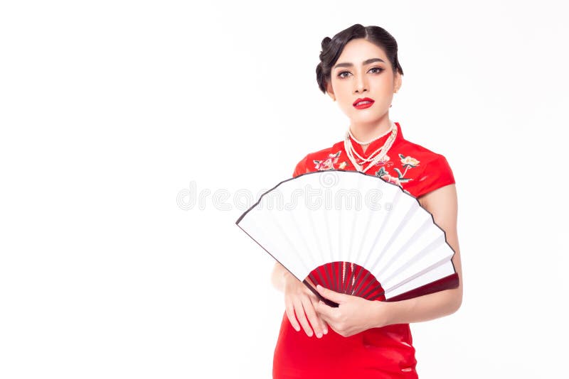 Attractive beautiful Chinese woman wear Chinese dress or cheongsam and pearl necklace in China New year with confident. Gorgeous royalty free stock photos Attractive beautiful Chinese woman wear Chinese dress or cheongsam and pearl necklace in China New year with confident. Gorgeous royalty free stock photos