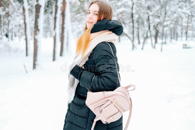 Premium Photo  Pretty young woman in winter outfit walking during