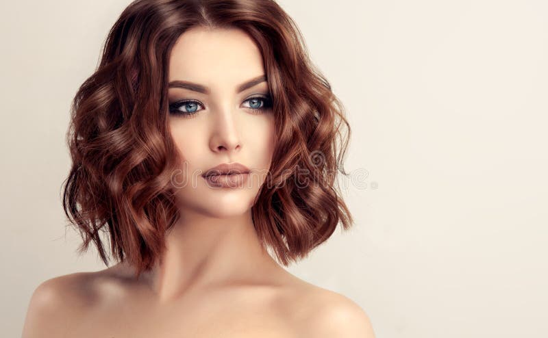 Attractive brown haired woman with modern, trendy and elegant hairstyle. stock photos Attractive brown haired woman with modern, trendy and elegant hairstyle. stock photos