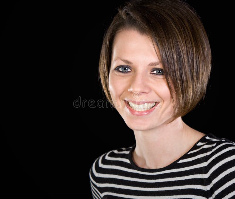 Attractive Brunette Smiling At Camera Stock Photo - Image 