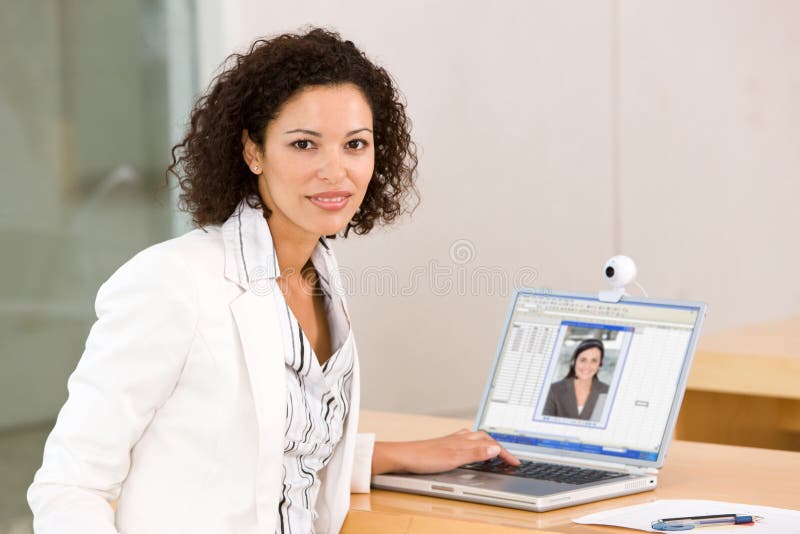Attractive business woman working on laptop stock photos Attractive business woman working on laptop stock photos