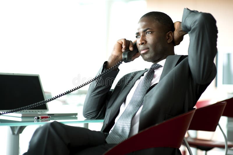 Attractive businessman on the phone