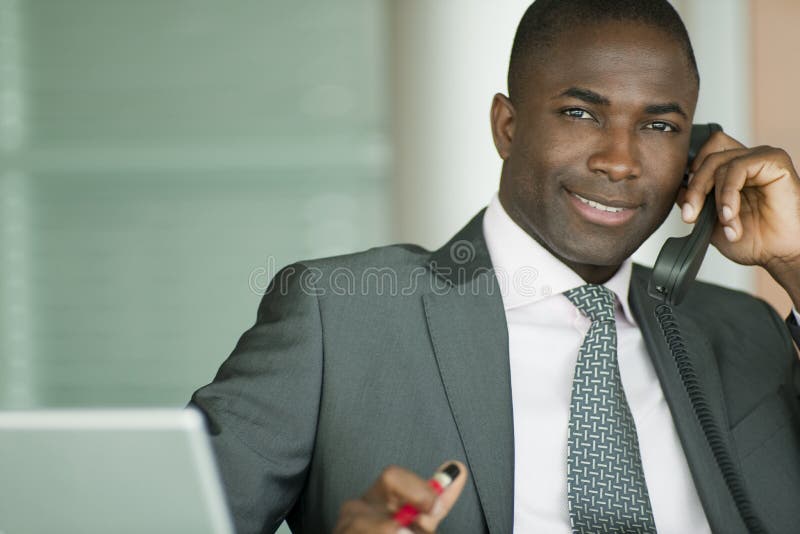 Attractive businessman on the phone