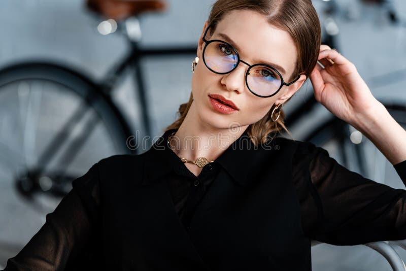 Attractive businesswoman in black clothes looking at camera and royalty free stock photos Attractive businesswoman in black clothes looking at camera and royalty free stock photos