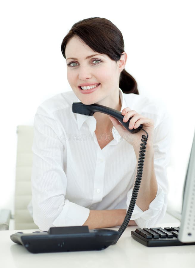 Attractive businesswoman holding a phone