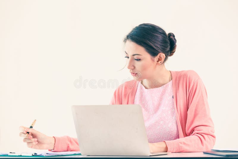 Attractive businesswoman sitting working royalty free stock photography Attractive businesswoman sitting working royalty free stock photography