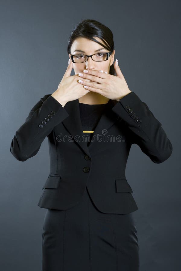 Attractive businesswoman speak no evil
