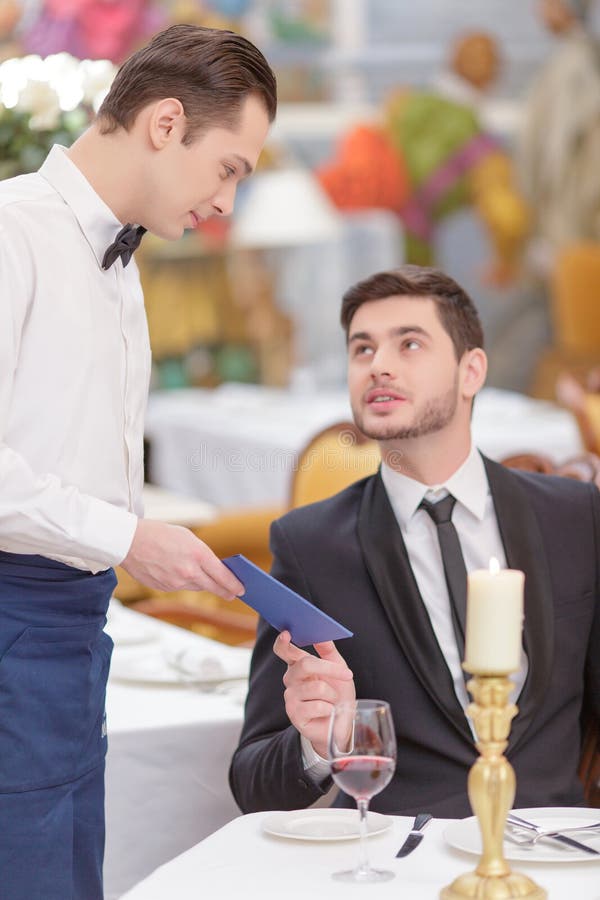 Attractive couple visiting luxury restaurant stock photo Attractive couple visiting luxury restaurant stock photo