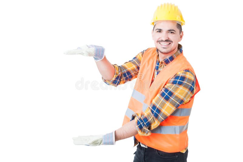 Attractive Engineer Holding Something Big while Acting Cheerful Stock ...
