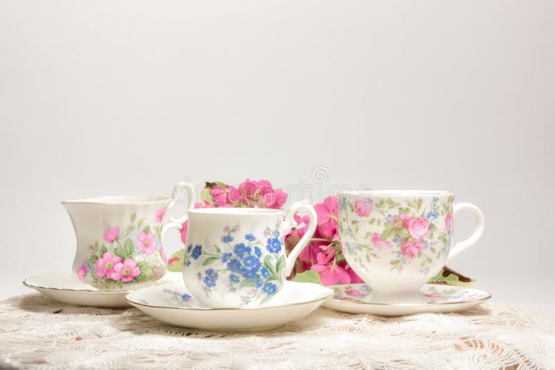 Attractive fine bone china tea cups on a neutral background