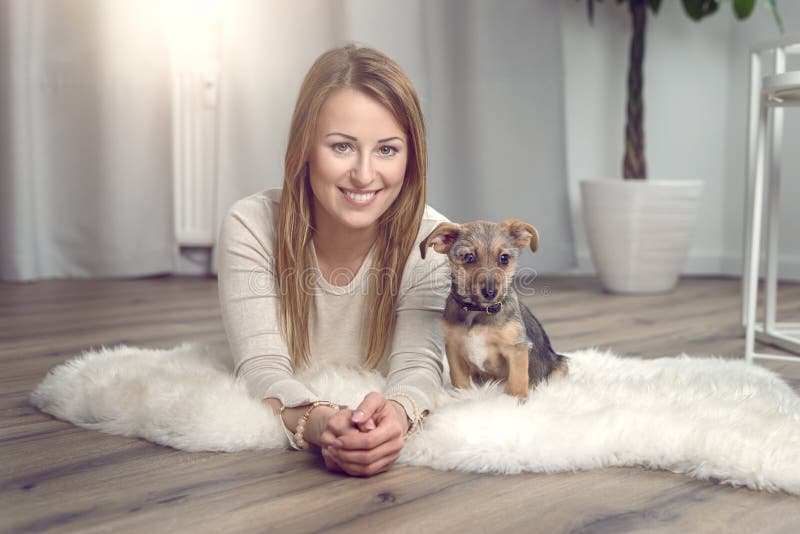 Attractive friendly woman with her dog