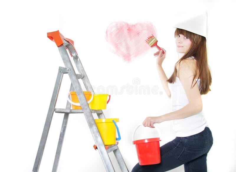 Attractive girl painting over white