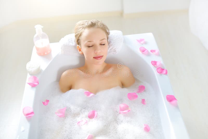 Attractive Girl Relaxing In Bath On Light Background Royalty Free Stock Image Image 29161526