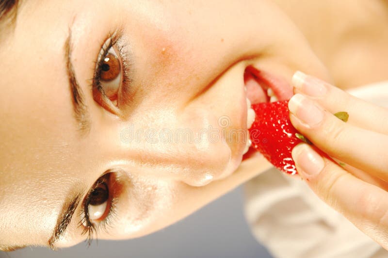 Attractive girl with strawberry 2