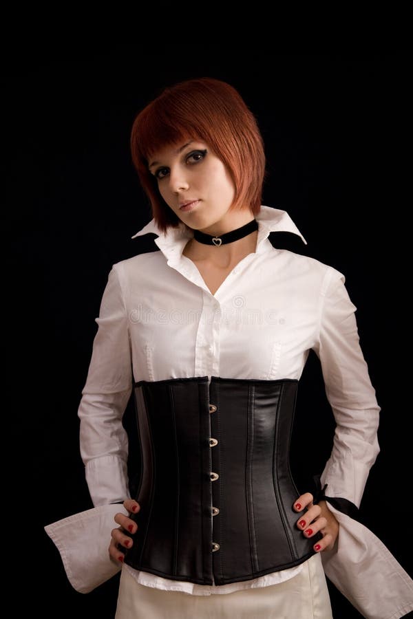 Attractive girl in white blouse and leather corset royalty free stock images Attractive girl in white blouse and leather corset royalty free stock images