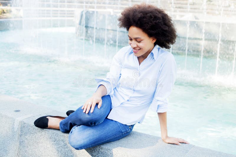 Attractive Happy Afro American Young Woman Outdoors stock photography Attractive Happy Afro American Young Woman Outdoors stock photography