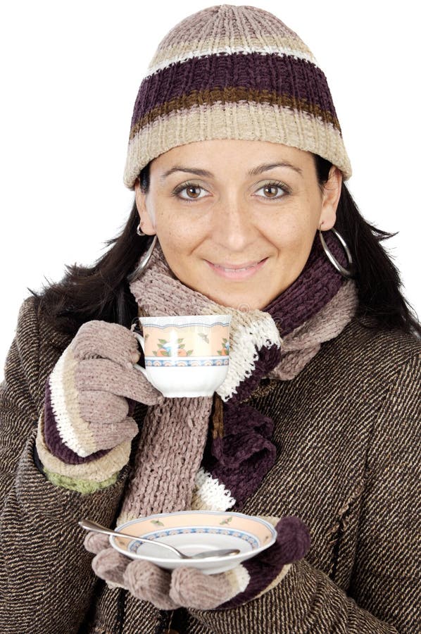 Attractive Lady Sheltered for the Winter Drinking a Tea Cup Stock Photo