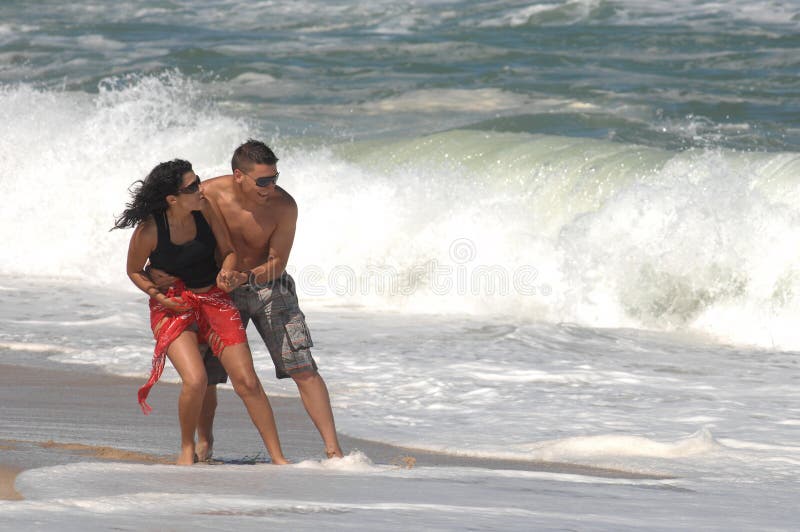 Attractive lovely couple on the beach