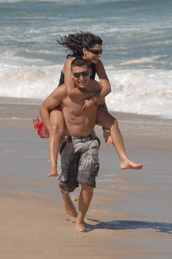 Attractive lovely couple on the beach