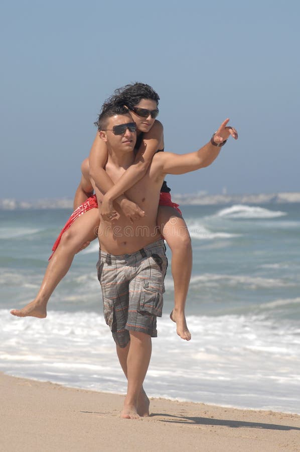 Attractive lovely couple on the beach