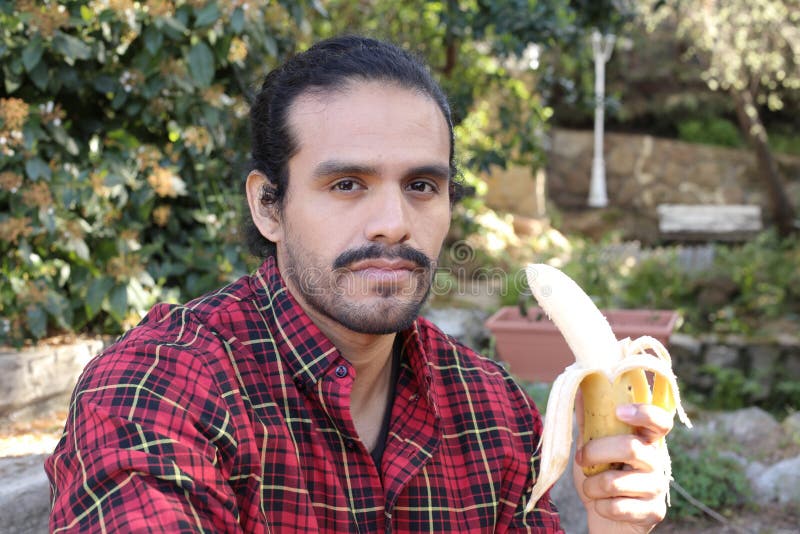 Attractive Man Eating a Banana Stock Image Image of lifestyle