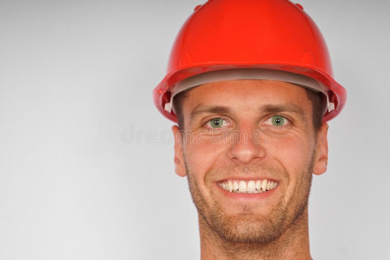 Attractive man in a protective helmet