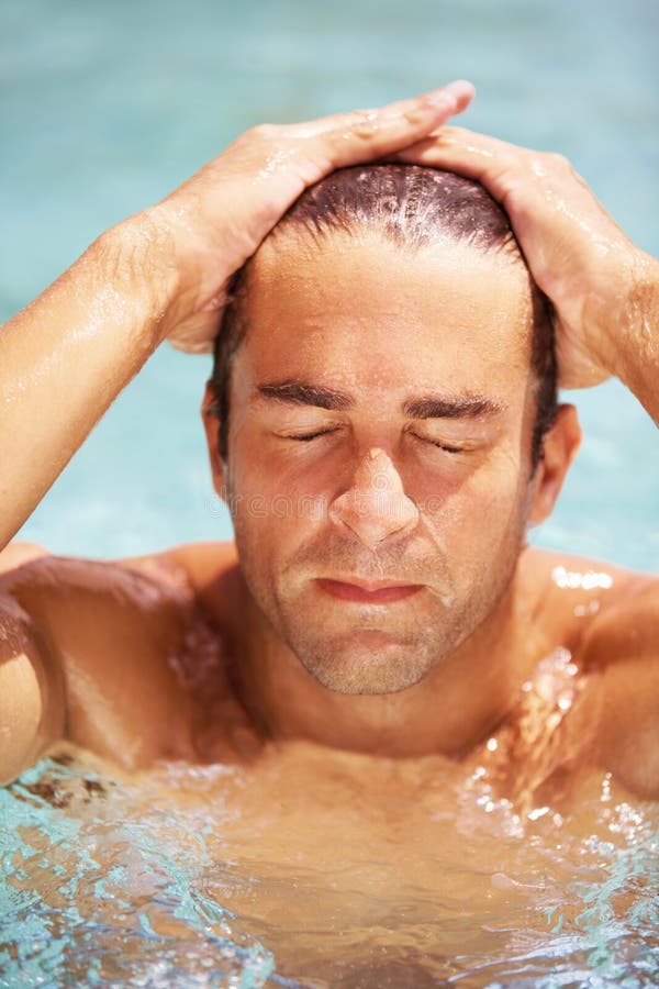 Attractive man swimming stock photo. Image of relaxed 21283082