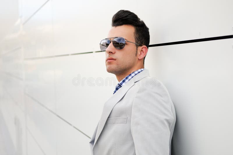 Attractive man with tinted sunglasses